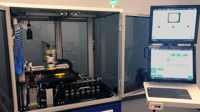 Cabinet-sized melee screening device connected to laptop