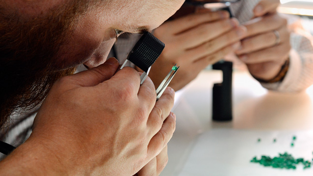 Wim Vertriest examining emeralds in Russia