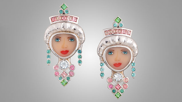 Figure 2. These “Gibson Girl” <em>millefiori</em> earrings in 18K white gold contain Paraíba tourmalines (1.11 carats total), pink tourmalines (1.54 carats total), and 0.56 carats of aquamarine. Photo courtesy of Brenda Smith.