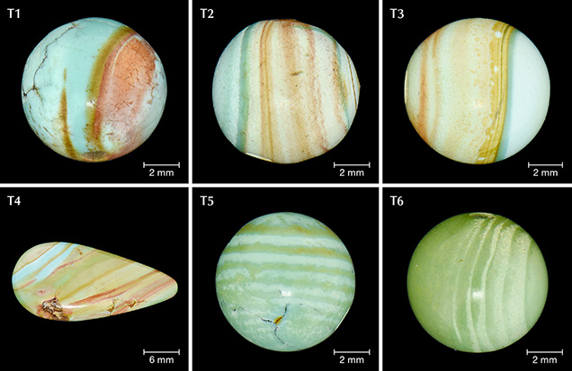 Six banded turquoise specimens showing variation in color and width of bands.