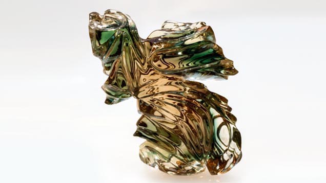 素晴らしい波型の彫刻は、サンストーンビュートが有名であるティールグリーンの帯状を示しています。 - Robert Weldon