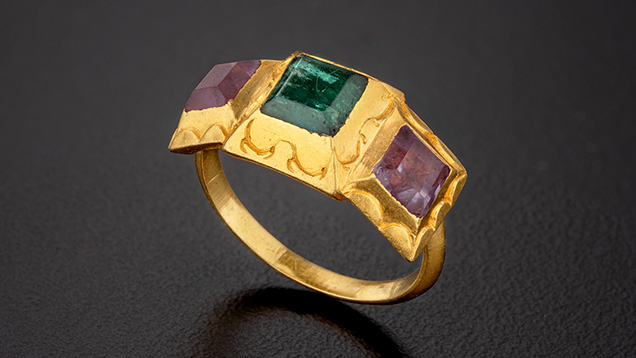Figure 3. An emerald and amethyst gold ring recovered from the shipwreck. Photo by Robert Weldon.