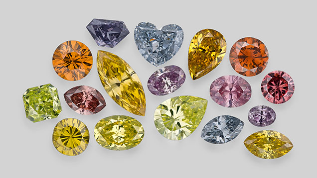 Figure 11. Fancy-color diamonds, such as these examples from the Aurora Butterfly of Peace, owe their spectacular hues to many causes, including tiny amounts of impurities, atomic-level structural defects, or plastic deformation deep in the earth. Photos by Robert and Orasa Weldon.