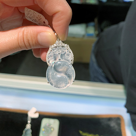 Highly transparent colorless jadeite pendant.