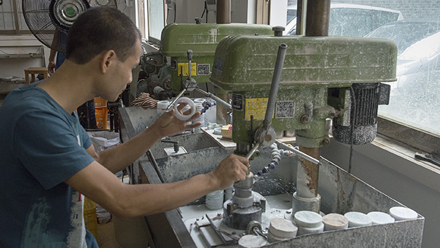 Chinese man manufacturing jadeite bangle