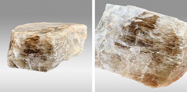 Figure 10. A large anorthoclase mass (7.1 × 6 9 × 3.0 cm) weighing 1550 ct was cut in half, and the two pieces are shown in these photos. The opaque section on the left is suitable for a cabochon, while the more transparent section on the right could be used for faceting. Photos by Le Ngoc Nang.
