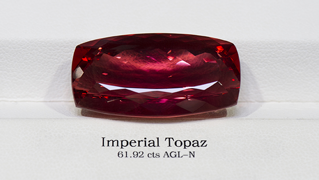A 61.92 ct Imperial topaz purchased on the secondary market.