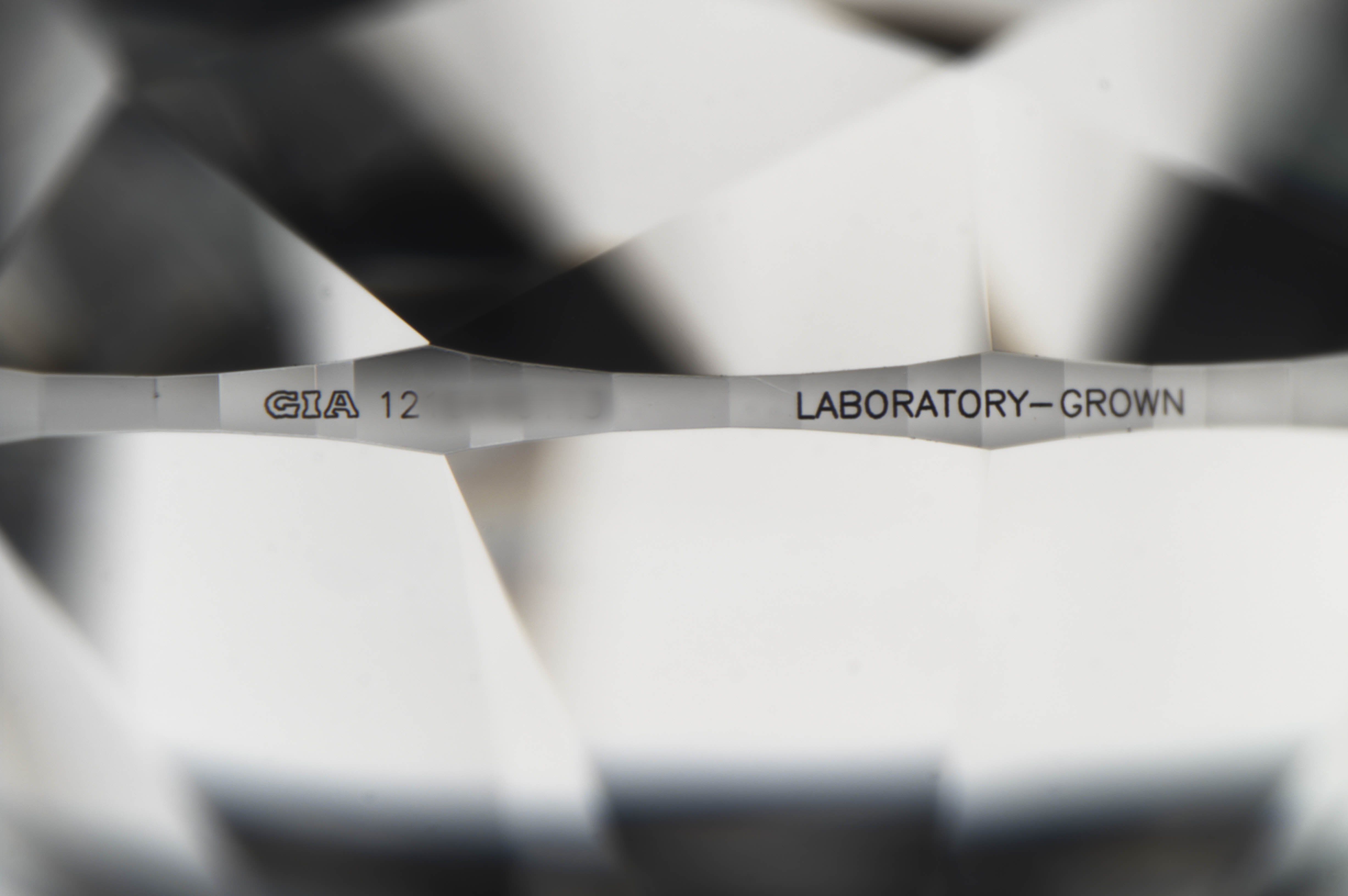 When GIA encounters a stone with a counterfeit inscription, the Institute issues a new, accurate report and inscribes the number of the new report