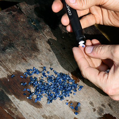 GIA field gemologists inspect blue sapphires in northern Mogok