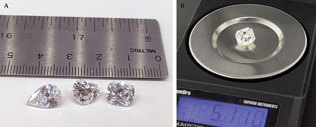 Three colorless synthetic diamonds weighing 2.02, 2.20, and 2.30 ct