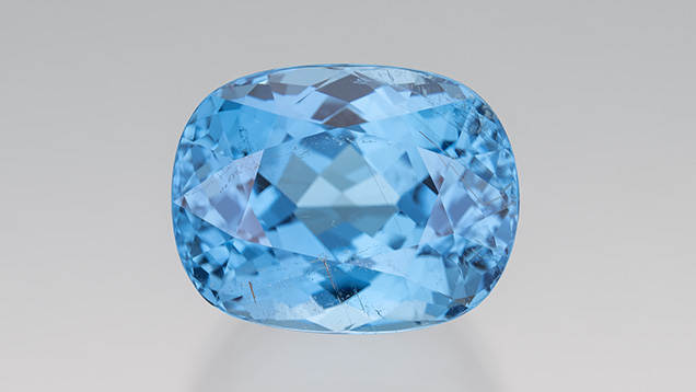Figure 3. A 30.26 ct blue cushion-cut cuprian tourmaline from Mozambique. Photo by Robert Weldon; courtesy of Evan Caplan.