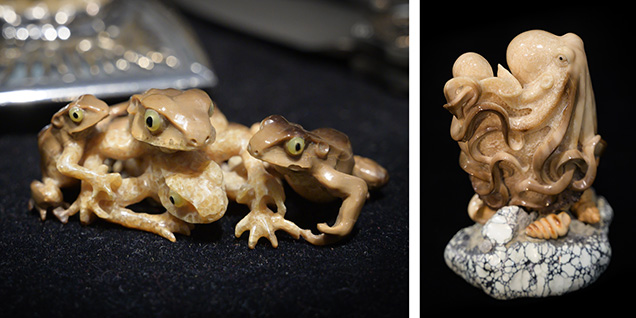Frog and octopus carvings crafted from fossil walrus ivory.