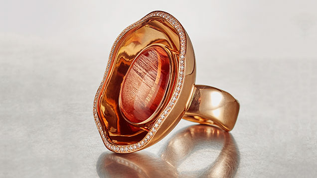 Freeform Oregon sunstone set in ring.