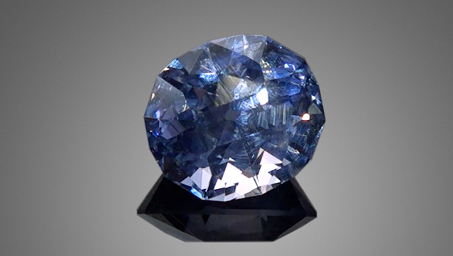 Unheated sapphire removed from a vintage 1960s platinum pendant.