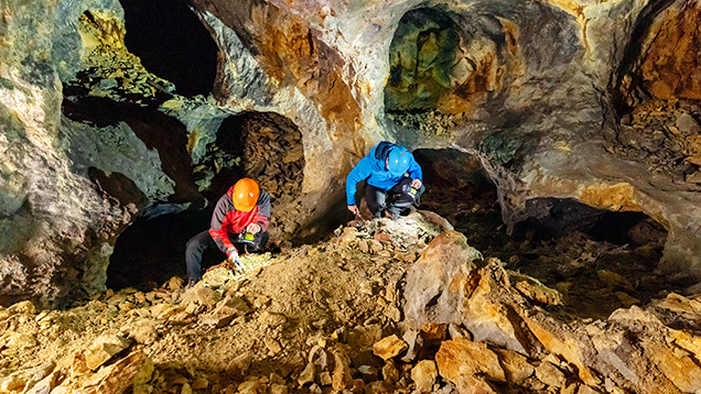 Figure 10. Opal hunting with Miroslav Kravec (blue parka) in the stope around the Jozef adit of the Libanka mine. Photo by Slavomír Krestian; courtesy of Slovenské opálové bane Ltd.