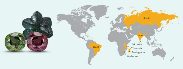 Figure 1. Left: Faceted alexandrite with color-change effect, with a rough crystal for comparison. The green color of the faceted stone is visible when exposed to daylight-equivalent illumination, while the red color is visible when exposed to incandescent illumination. Photos by Robert Weldon; rough crystal courtesy of William F. Larson and faceted stone courtesy of GIA’s Dr. Edward J. Gübelin collection, no. 34767. Right: World map indicating seven major alexandrite sampling localities. Other sampling localities are not discussed in this study (e.g., Sun et al., 2019).