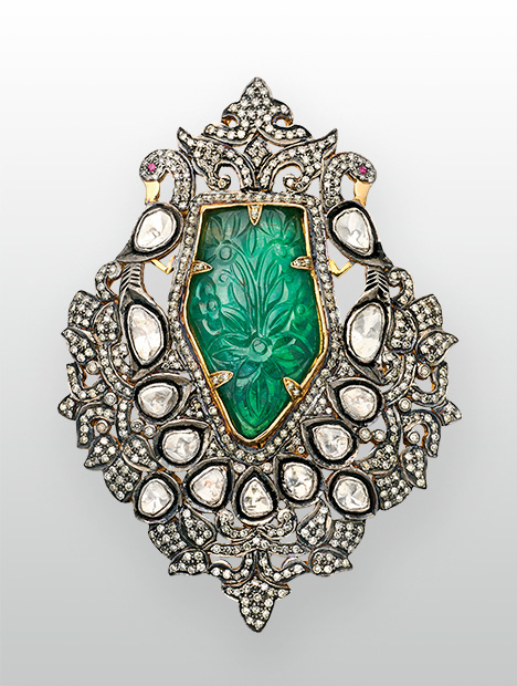 Peacock brooch featuring Zambian emerald