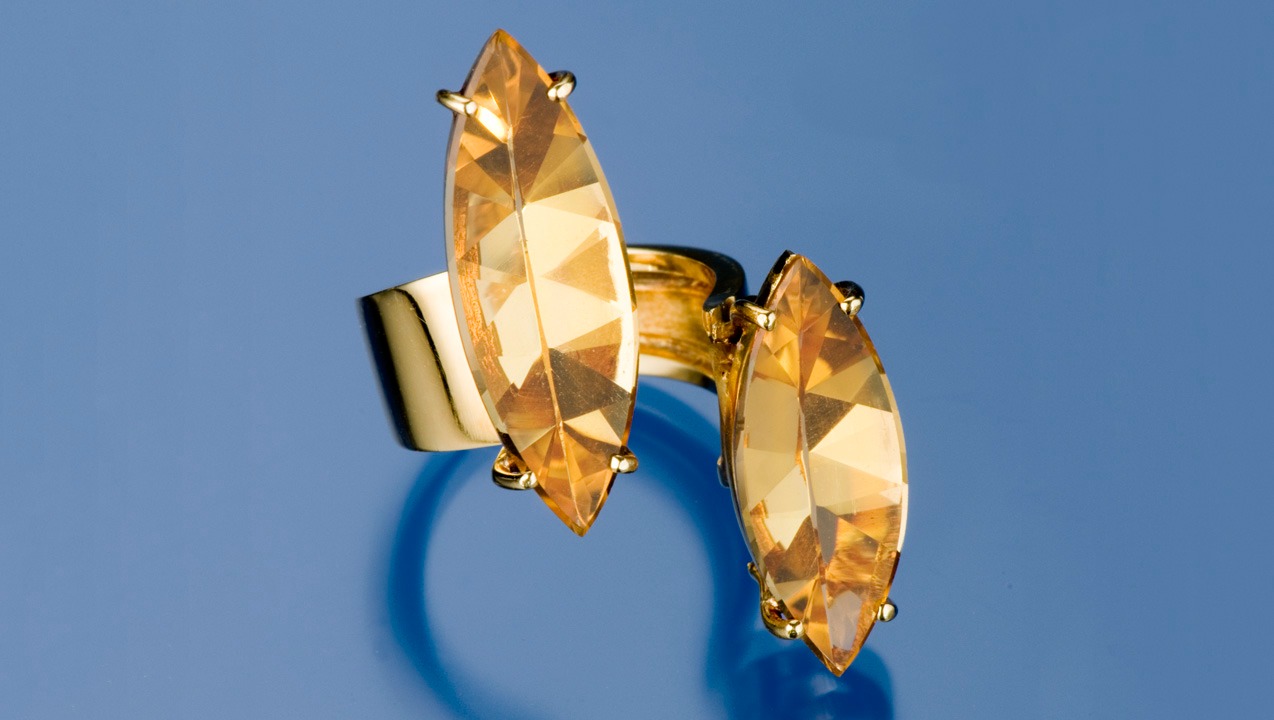 Eye-clean gems like these are perfect for the “Pluto” ring. The citrine and gold design was inspired by the stars and the cosmos.  - Robert Weldon, gift of Patricia MB Gotthilf"