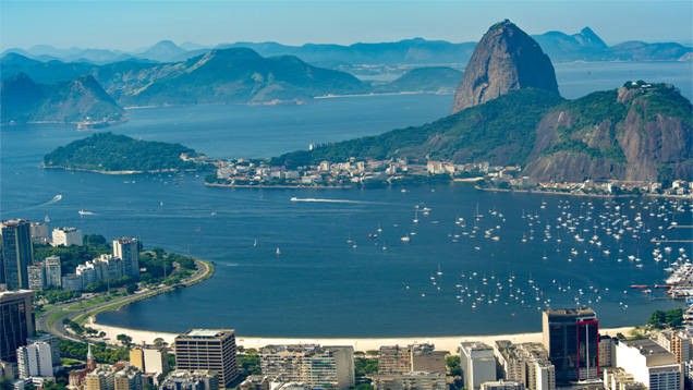 From the Mirador, this iconic vista of the city of Rio de Janeiro encompasses picturesque bays and inslets, surrounded by inselbergs, or mountains that jut out across the landscape. Photo by Robert Weldon/GIA