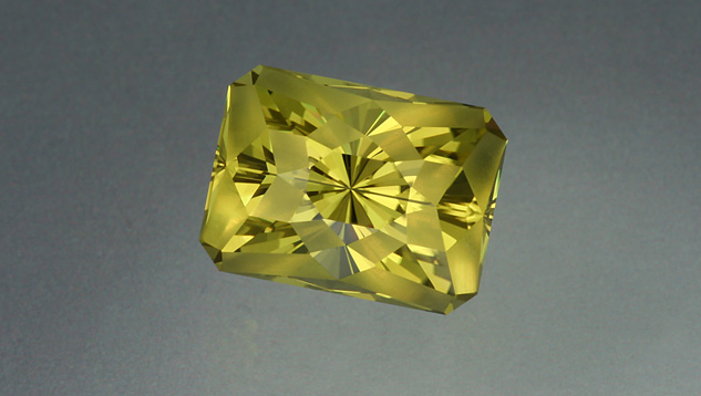 Lime-colored citrine can result from heat treatment of smoky quartz. The gem’s designer used some frosted facets to highlight its trendy color. – Lydia Dyer,  gem courtesy John Dyer & Co