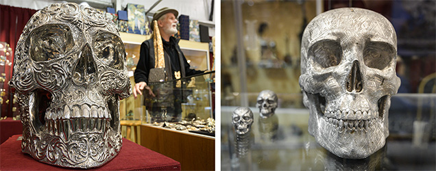 Skull carvings by Artifactual in stainless steel (left) and Gibeon meteorite (right).