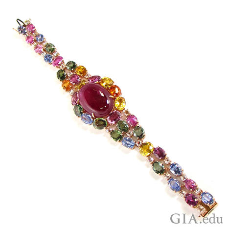 The “Candy” bracelet by VTse Jewelry is comprised of a red oval cabochon tourmaline and multi-colored sapphires. Courtesy VTse Jewelry