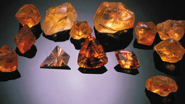 This group of rough and fashioned citrines exhibits the reddish orange colors enjoyed by consumers. - Dan Van Rossen, courtesy ICA