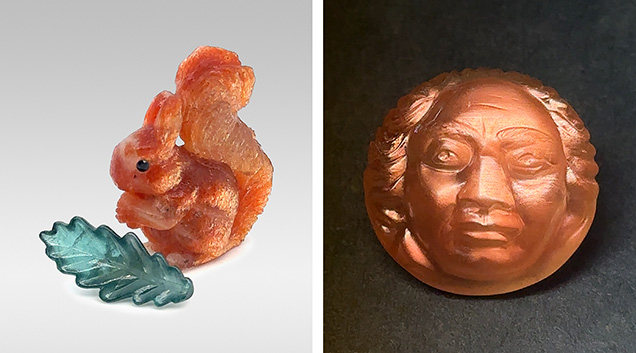 Figure 6. A 63.0 ct hand-carved Indian sunstone squirrel with a tourmaline leaf measuring 33.5 mm high (left) and a 43.10 ct Oregon sunstone depicting a moon face inspired by Beethoven measuring 11.8 mm high (right). Both carved by Hans-Ulrich “Uli” Pauly of Idar-Oberstein, Germany. Photos by Gaby Pauly; courtesy of Pauly Carvings.