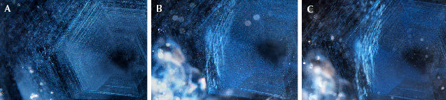 Figure 51. Rutile silk and particles in example 4 in the unheated (A), heated (slowly cooled, B), and heated (rapidly cooled, C) states showing the existence of rutile particles even in the heated and rapidly cooled sapphire. Photomicrographs by Aaron Palke; field of view 3.57 mm.