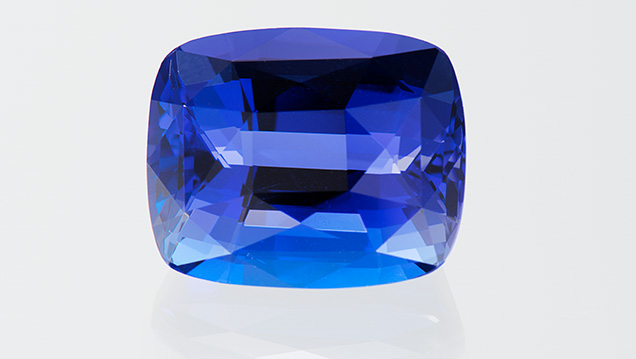 22.6 ct precision cushion-cut deep blue tanzanite.