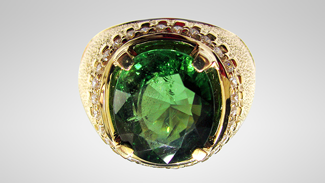 Ring containing 7.1 ct green uvite tourmaline from Luc Yen