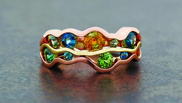 Figure 4. This “Fiume” ring features a wide range of colors seen in Montana sapphire. The sapphires are all heat treated, with 2.07 total carat weight. Photo courtesy of Raintree Jewelry.