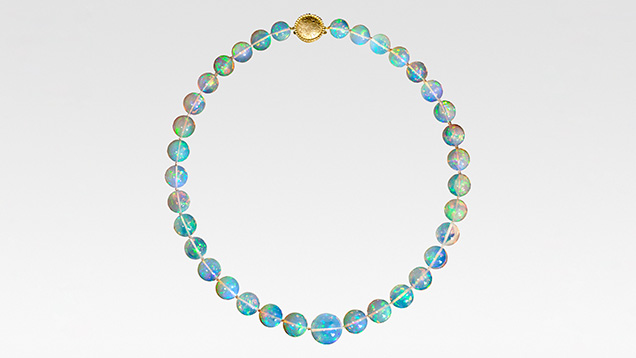 Figure 6. This 22-inch “Ethereal Light” necklace contains 35 translucent Ethiopian opal beads totaling 426 carats and is finished with an 18K gold handmade clasp. Courtesy of Paula Crevoshay.