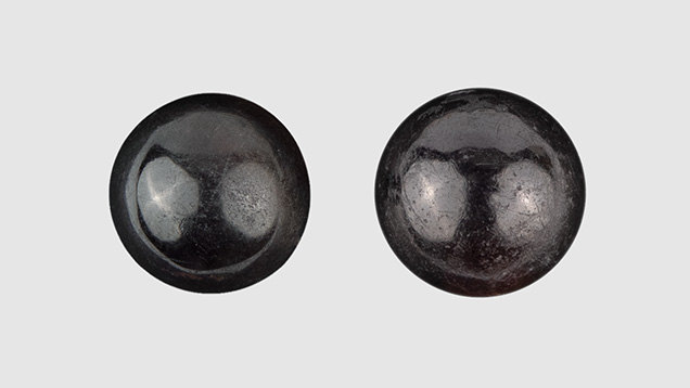 Near-round beads cut from shell.