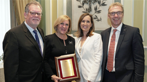 Susan Jacques accepted the Stanley Schechter Award at the Jewelers Vigilance Committee (JVC) luncheon on Jan. 10, 2020. From left: Joel Schechter, retired CEO of Honora; Susan Jacques, GIA president and CEO; Tiffany Stevens, JVC CEO and general counsel; and Charles Stanley, president of Forevermark US and 2020 Chairman of the JVC Board.