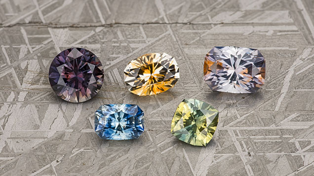 Figure 20. Parti-colored sapphires are occasionally found in Montana and can combine a wide range of colors. These examples, ranging from 1.62 to 3.20 ct, are all heated. Photo by Jeffrey R. Hapeman.