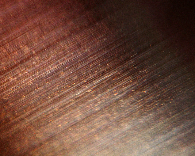 Iridescent needles and particles in alexandrite.