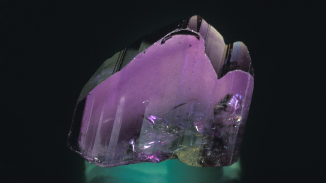 Tanzanite Crystal. In this crystal direction, this tanzanite's violet-to-purple pleochroic color is evident. - Jeff Scovil