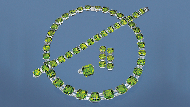 Suite of Peridot Jewelry. This incredible suite of peridot jewelry has a total weight of 350.40 carats. All are top-quality peridots from Pakistan. - © GIA & Harold & Erica Van Pelt