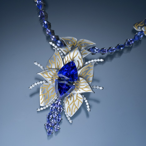 Award-winning Necklace. This award-winning jewelry piece features two triangular tanzanites set back to back. The stones were cut with the proper orientation and proportions to allow maximum enjoyment of their deep violet blue color. - Courtesy Tanzanite Foundation ™