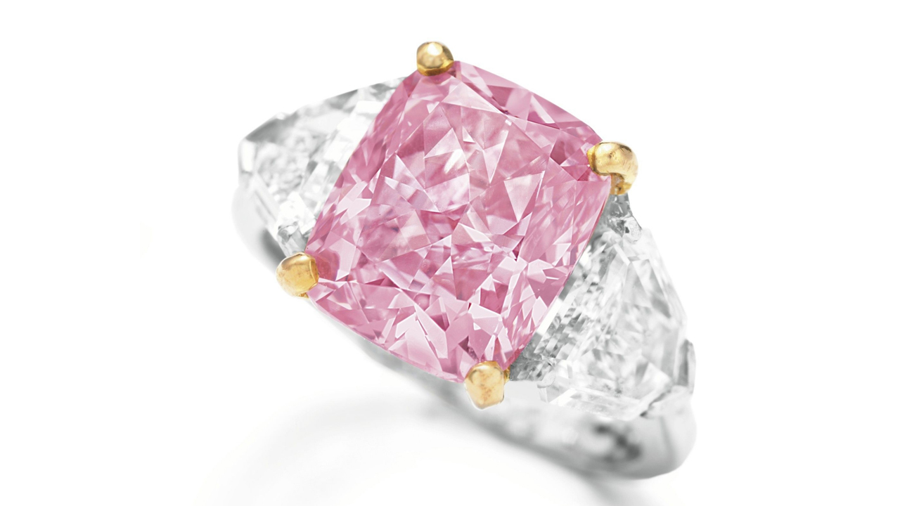 The-Vivid-Pink_Ring-VRL-144918_1280x720.jpg. This 5 carat, cushion-shaped Fancy Vivid pink diamond set a record for the highest per carat price for any gem when it sold for $10.83 million at a December 2009 Christie’s auction in Hong Kong. The natural color pink diamond is set in platinum and 18k rose gold. Photo courtesy of Christie’s Images LTD 2013.