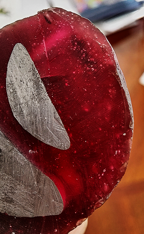 W16-GNI-Figure-14_210769-468x756.jpg. Air bubbles in resin matrix.